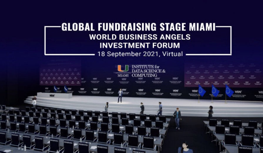 Global Fundraising Stage Miami logo over auditorium photo