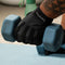 Hand gripping a weight with MetaFlex Grip Strengthening Compression Gloves